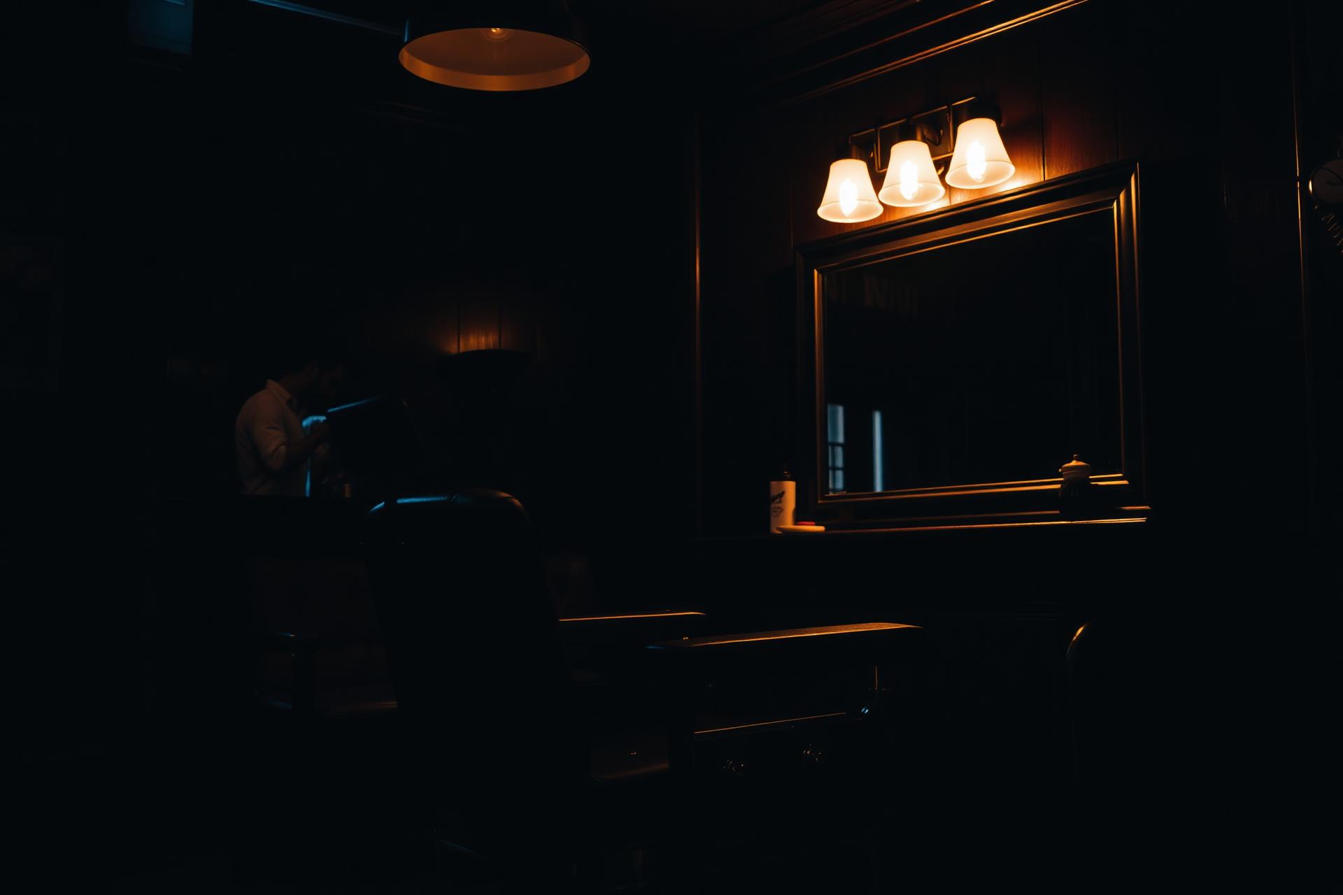 Crown & Fade barbershop interior with vintage chair and warm lighting
